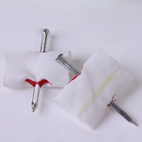 Bloody Nail Through Finger Prank Toy